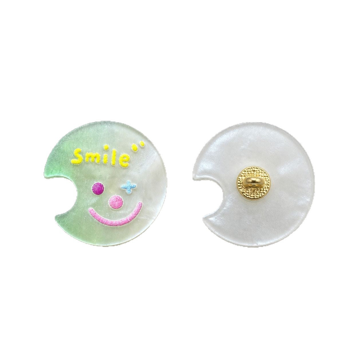 Green moon-shaped resin shank button with colorful smiley face; gold back shank detail