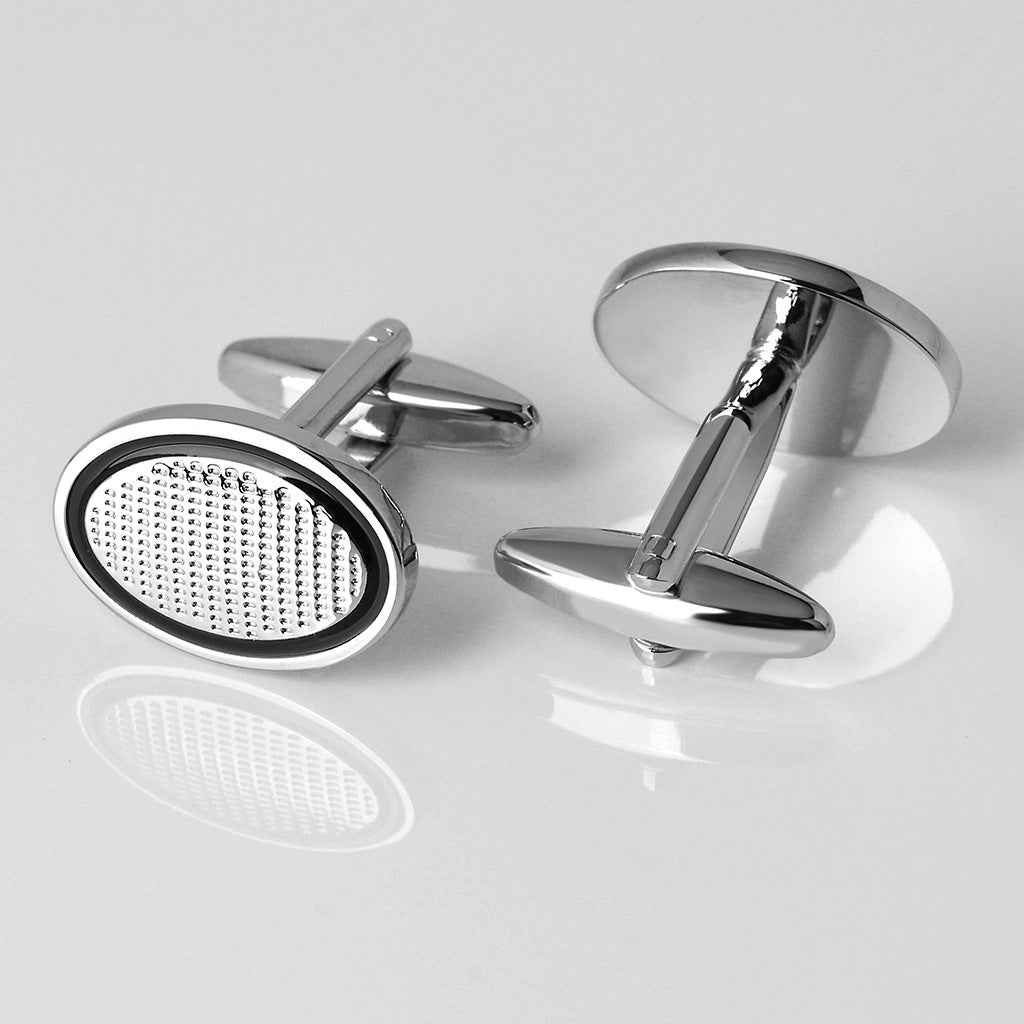 Black oval cufflinks for men with silver frames and dotted white centers