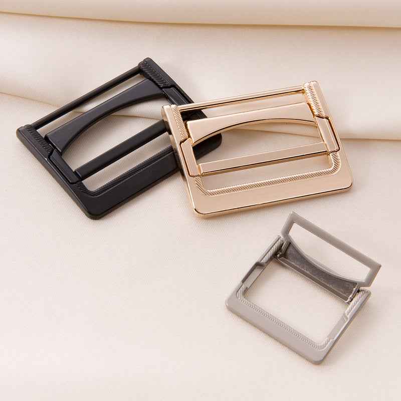 Black and rose-gold 25–45mm metal belt buckles with rectangular frames, center bar