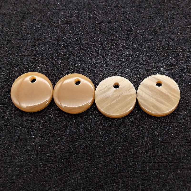 Round single-hole resin decorative buttons, 18L (11.5mm); beige and light tan buttons with central hole