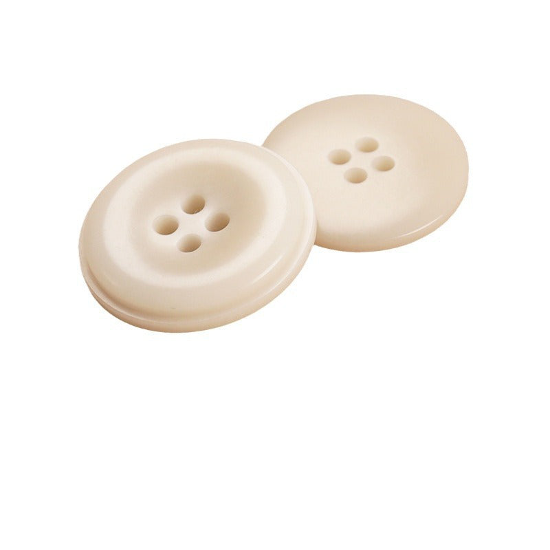 Round 4-hole natural fruit shell buttons, off-white, two-button view