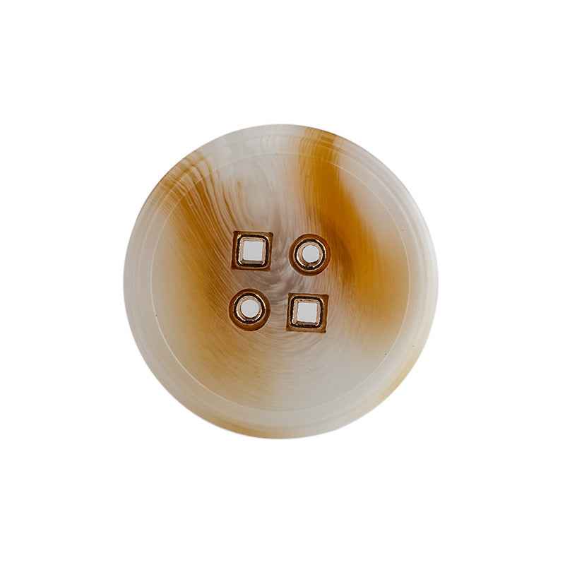 Black round resin button with four metal holes, 4-hole front view