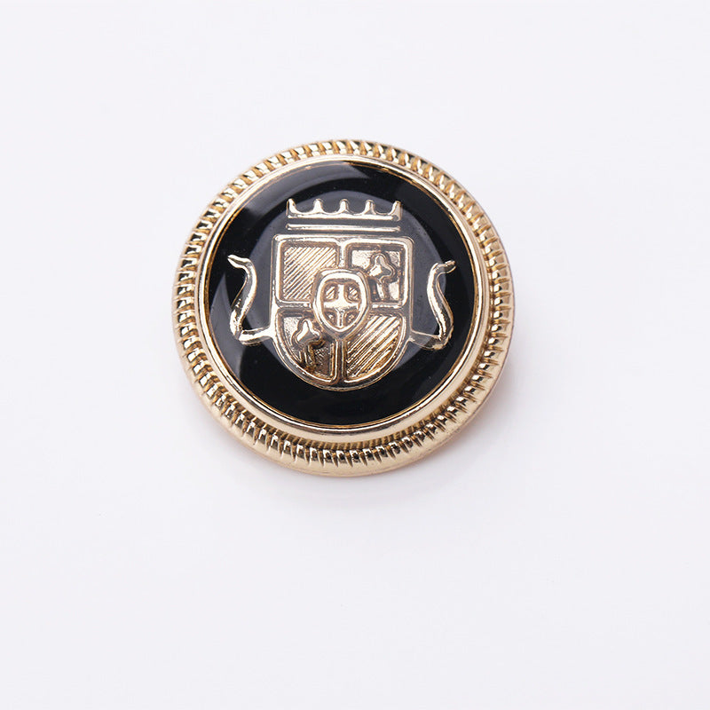 Round crown enamel metal shank button, black enamel front with gold-tone crown emblem