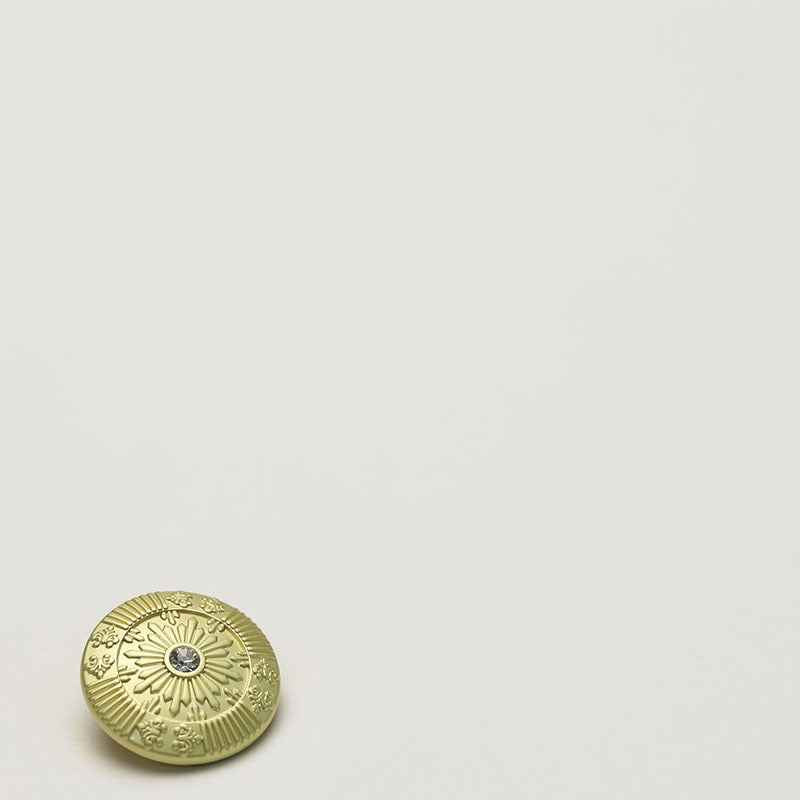 Frosted metallic sun shank button, light gold tone with crystal center, front view