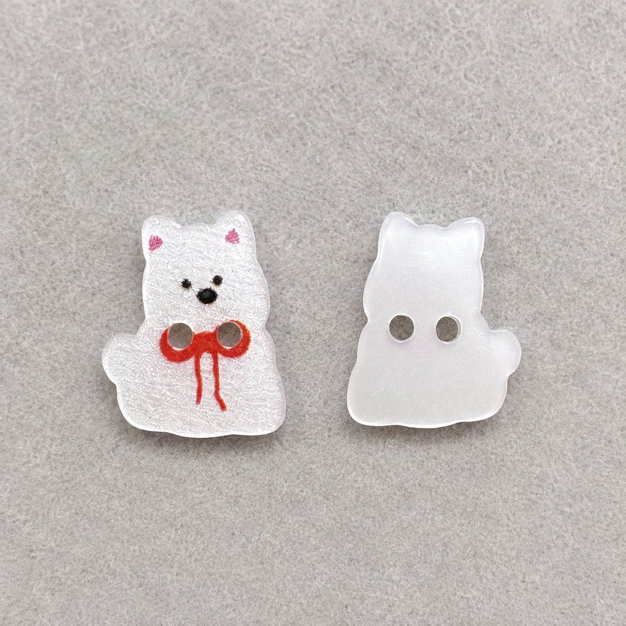 White puppy dog resin button front and plain back with two holes