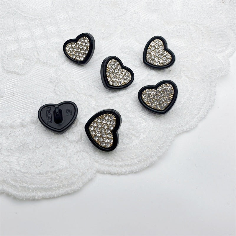 Heart rhinestone button, black metal back with prong; clear crystal front