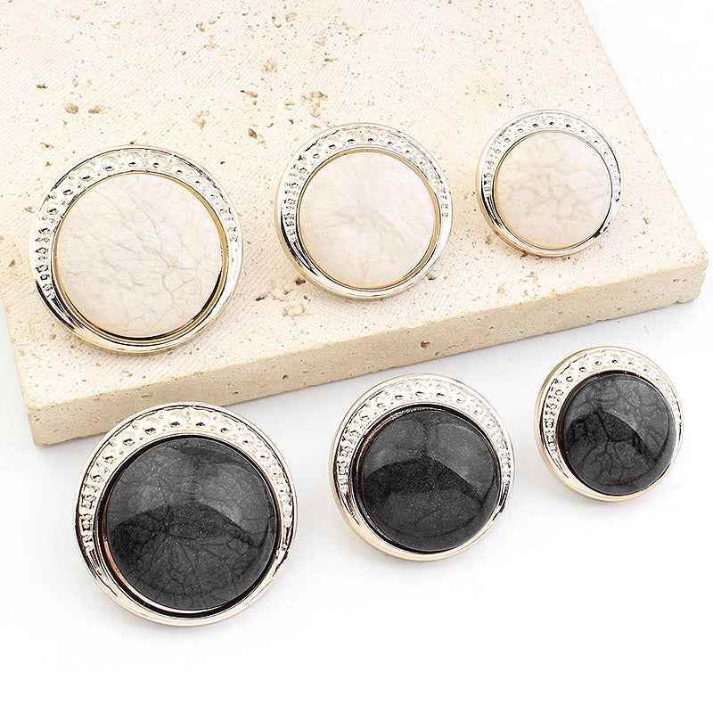 Round resin shank buttons set, cream and black colors, silver-tone rims with textured border