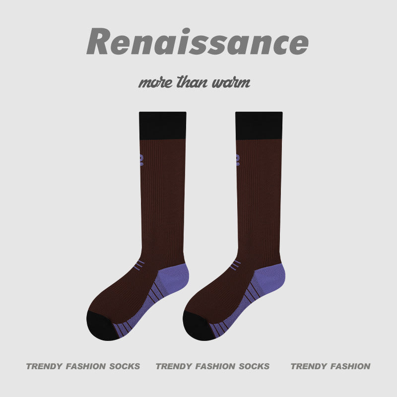 Dark brown compression crew running socks with black toe and blue trim, pair