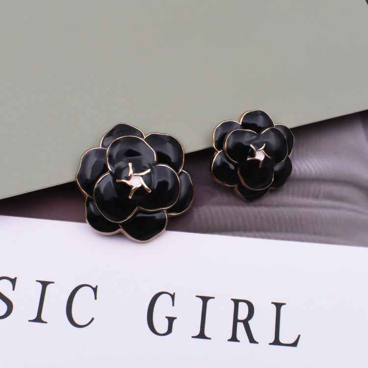 18/23mm Camellia metal shank buttons, black, star center, 10pcs