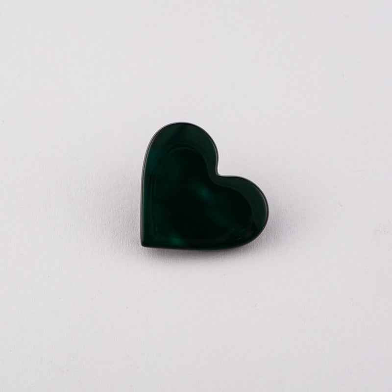 Dark green flat heart button with metal shank, glossy front