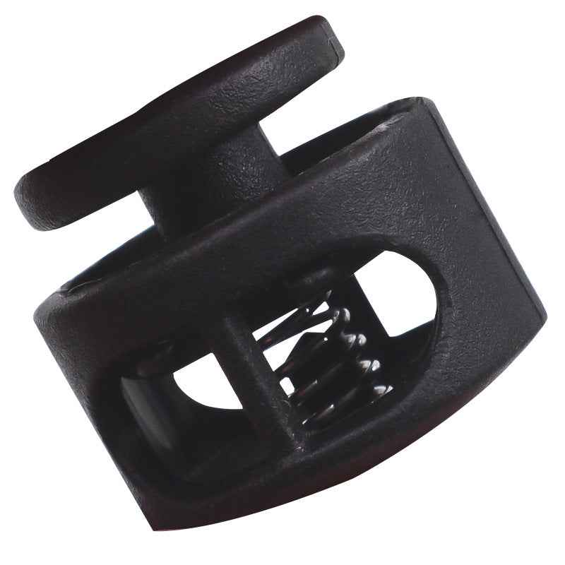 Black plastic cord lock close-up with central opening for drawstring
