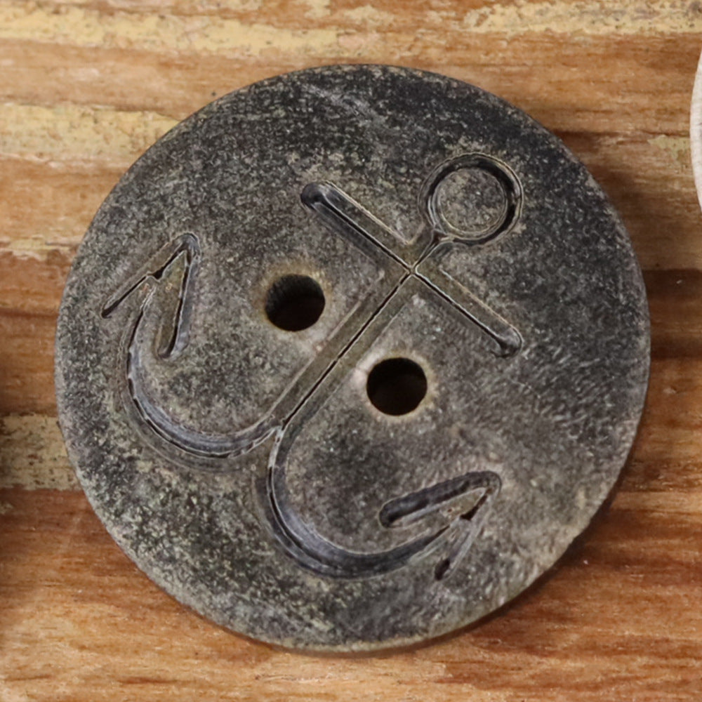 Anchor-shaped buffalo horn button, medium brown with four holes