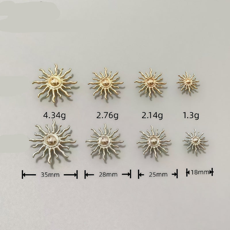 Sun-shaped metal shank buttons with size variation, gold and silver tones