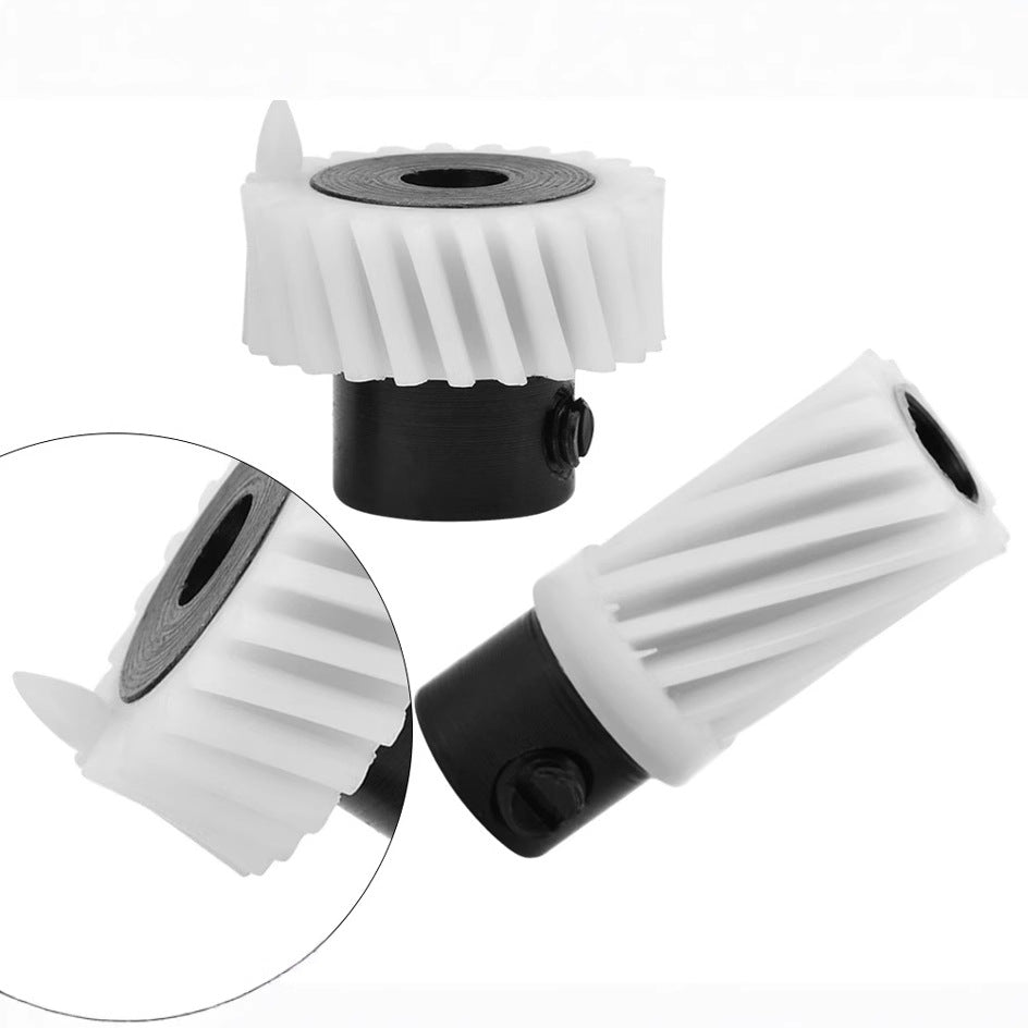 Feed dog drive shaft gear kit components: white gear, black coupler, mounting plate