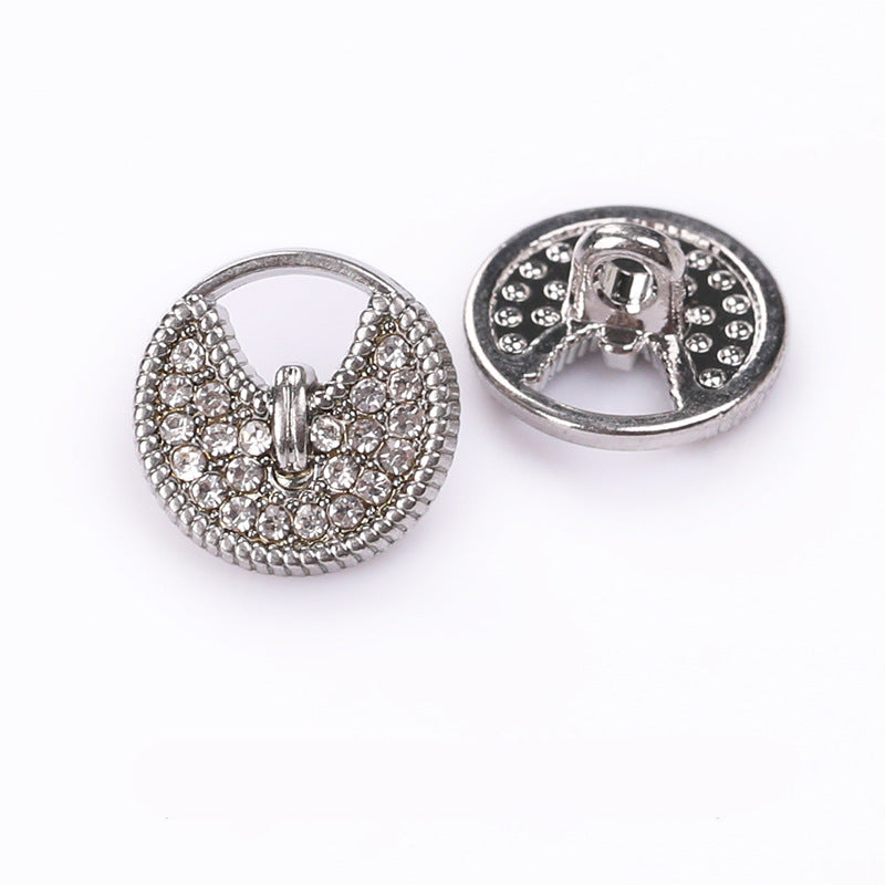 Round button with hollow metal shank, silver finish and clear rhinestones, front and back