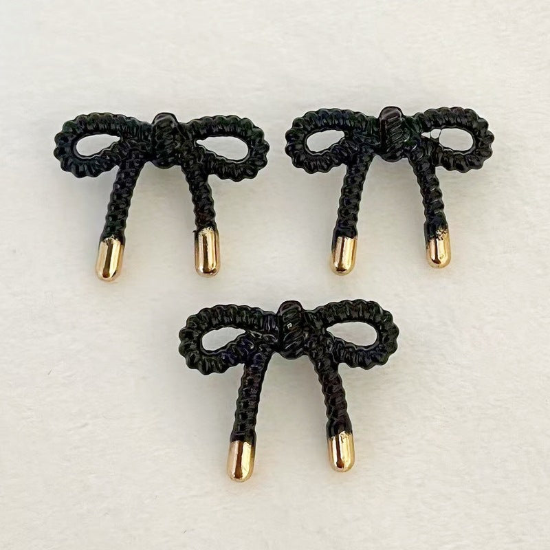 Lace Butterfly hollow metal buttons, black tone bow design, thin edge detail