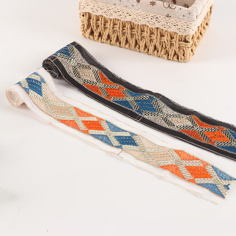 Mesh lace trim, black base with X diamond embroidery, 6cm wide