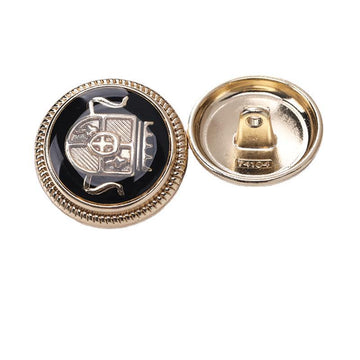 Round crown enamel metal shank button, black enamel with gold-tone rim and crown detail