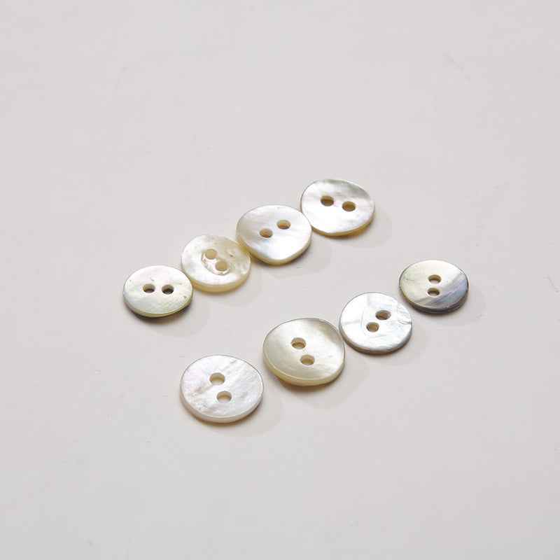 Round mother-of-pearl shell buttons, 2-hole, off-white iridescent finish (100 pack)