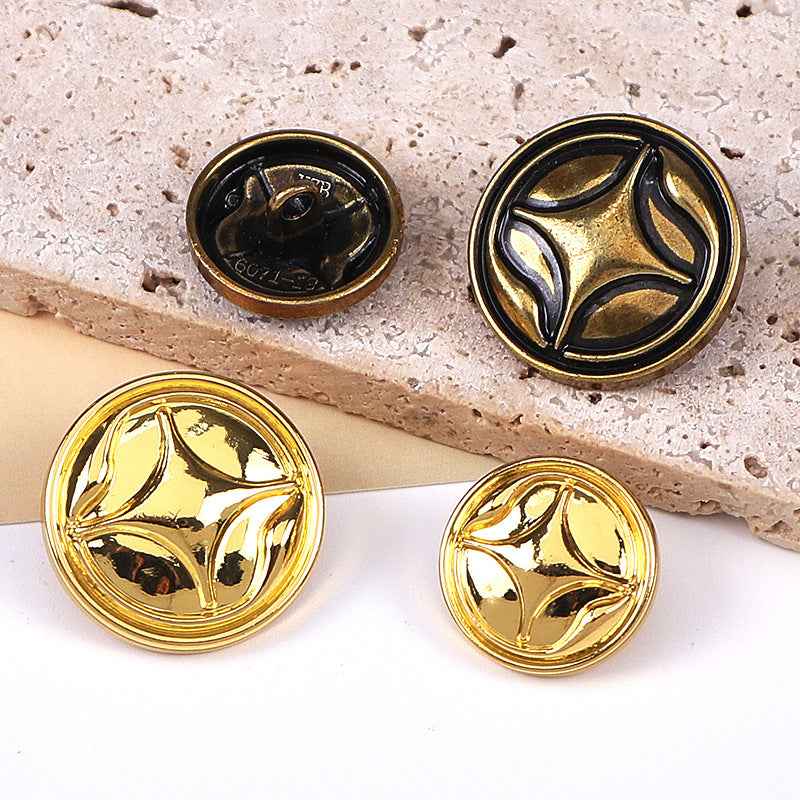 Four-point star metal shank sewing buttons, gold and bronze tones, visible front designs