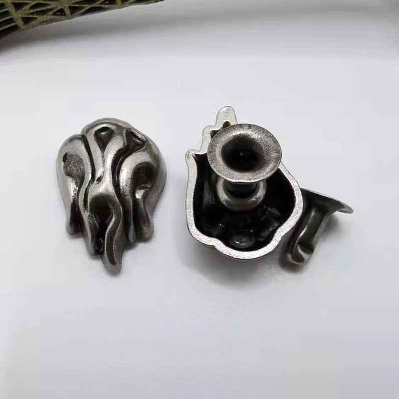 Vintage flame stud rivets in dark silver metal, leather craft hardware (pair shown)