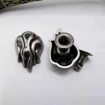 Vintage flame stud rivets in dark silver metal, leather craft hardware (pair shown)