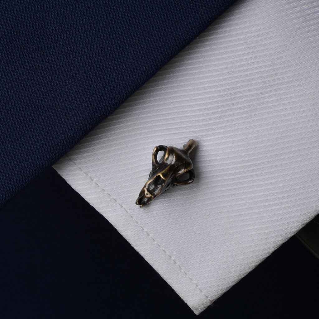 Vintage Bronze Dinosaur Skull cufflinks, detailed skull on hinged bar