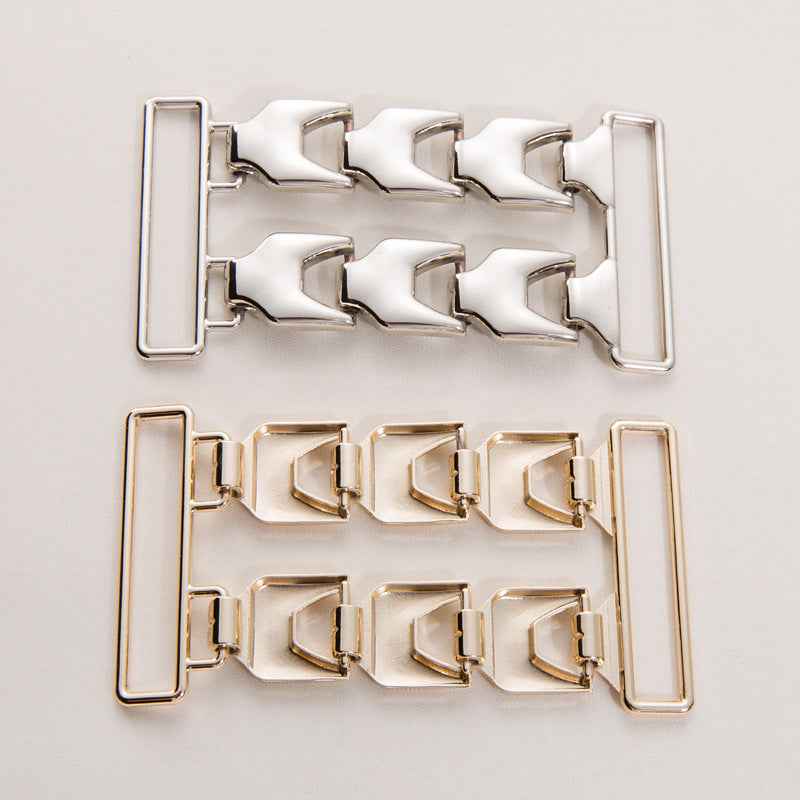 Gold and silver double-row chain buckle set with paired clasps in two tones