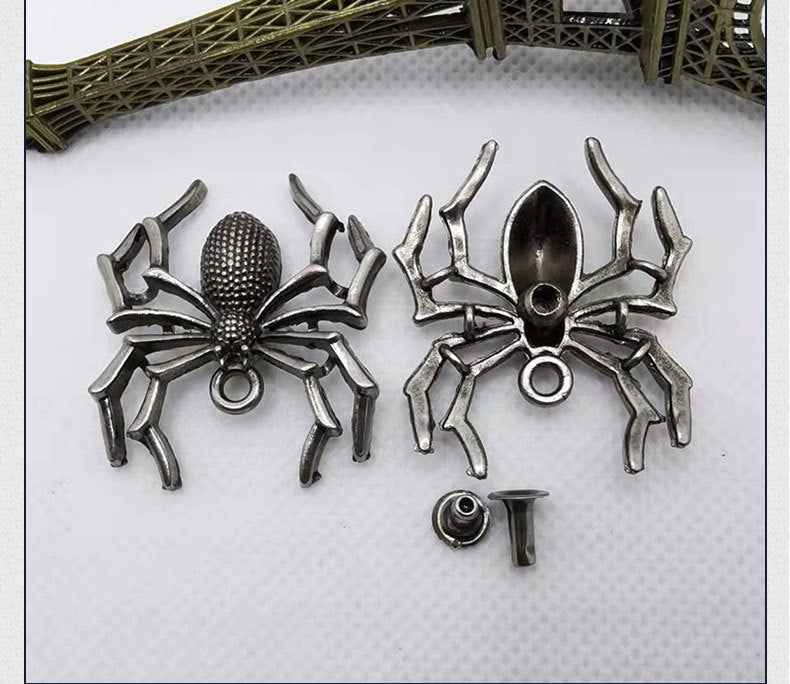 Silver spider claw rivet studs set with two designs and one backing post