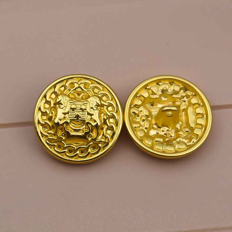 Vintage gold metal shank button with lion crest and ornate border, 15–25mm