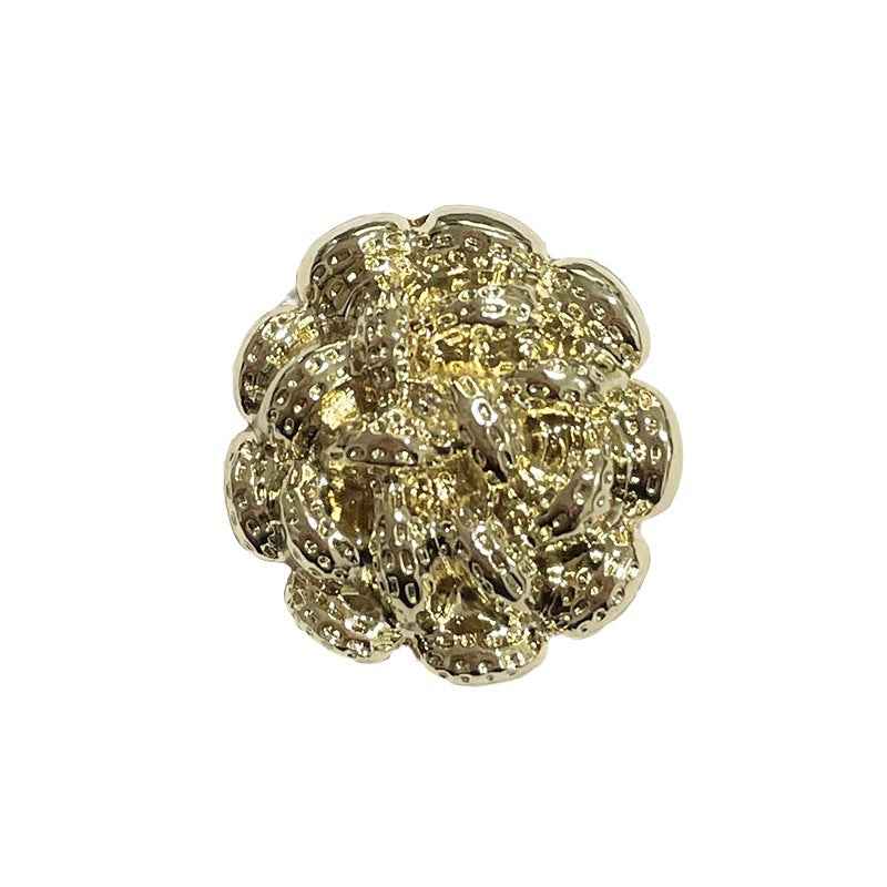 Gold spiral flower metal shank button, single close-up