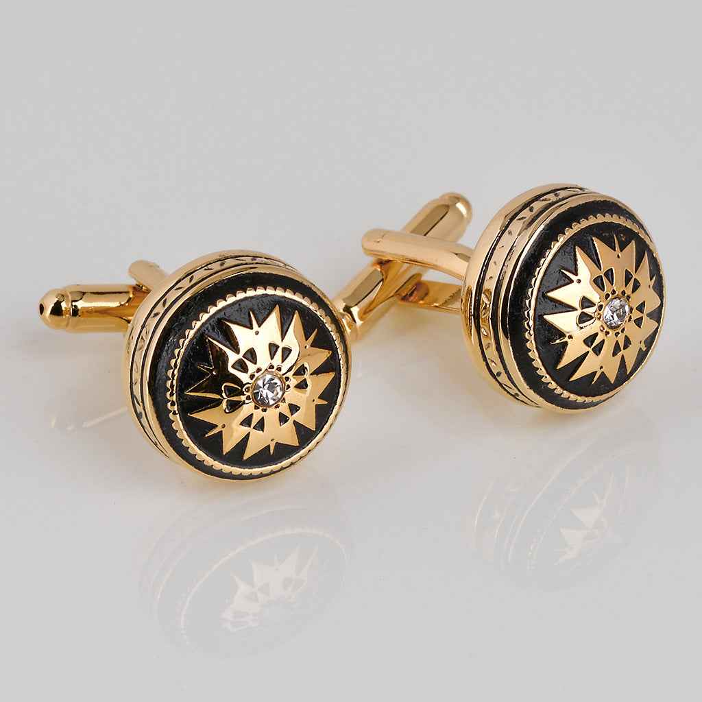 Gold-tone black enamel crystal cufflinks with starburst design