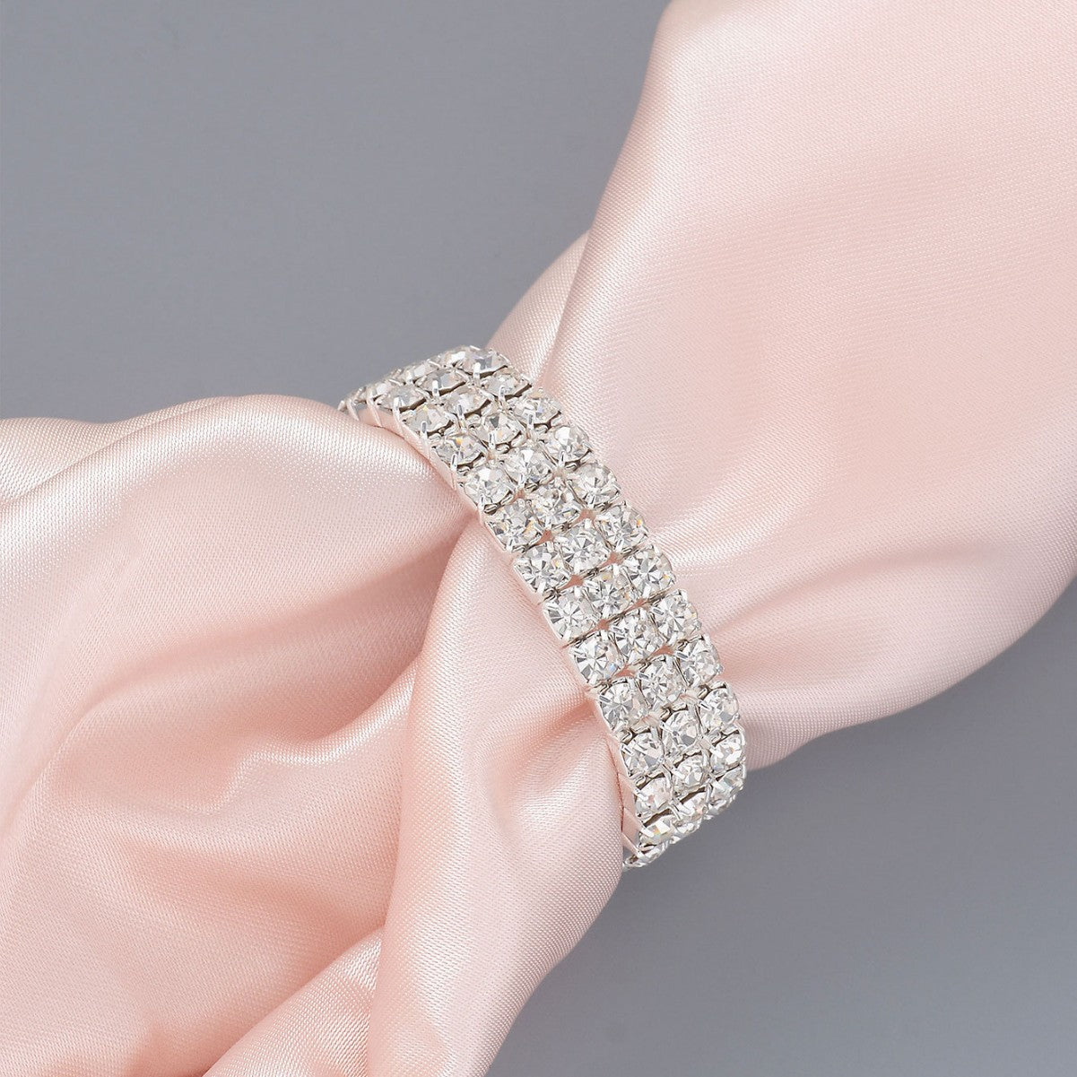 Rhinestone button clasp band with open-loop ends, sparkly crystal rows