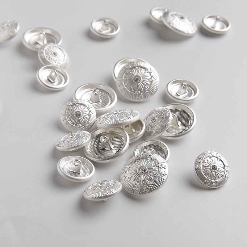 Frosted metallic light silver sun shank buttons with crystal center, mixed angles