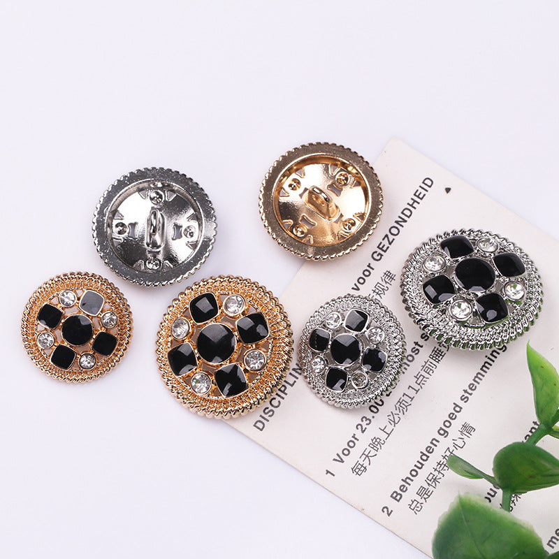 Hollow round crystal buttons with black enamel: gold and nickel-silver backs