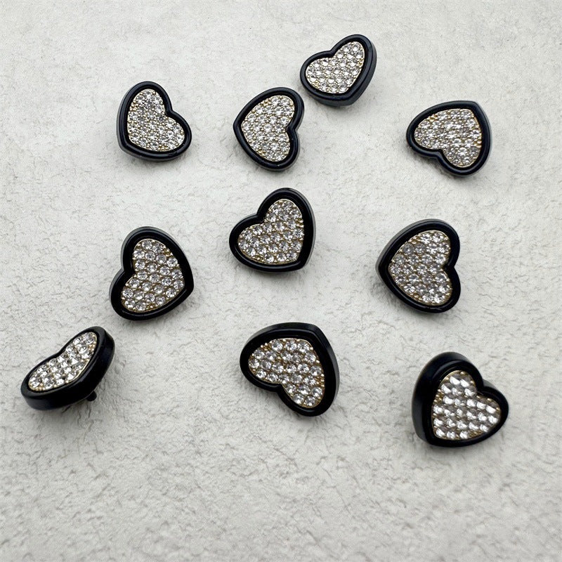 Heart-shaped rhinestone button, black metal trim, clear crystal sparkle (single)