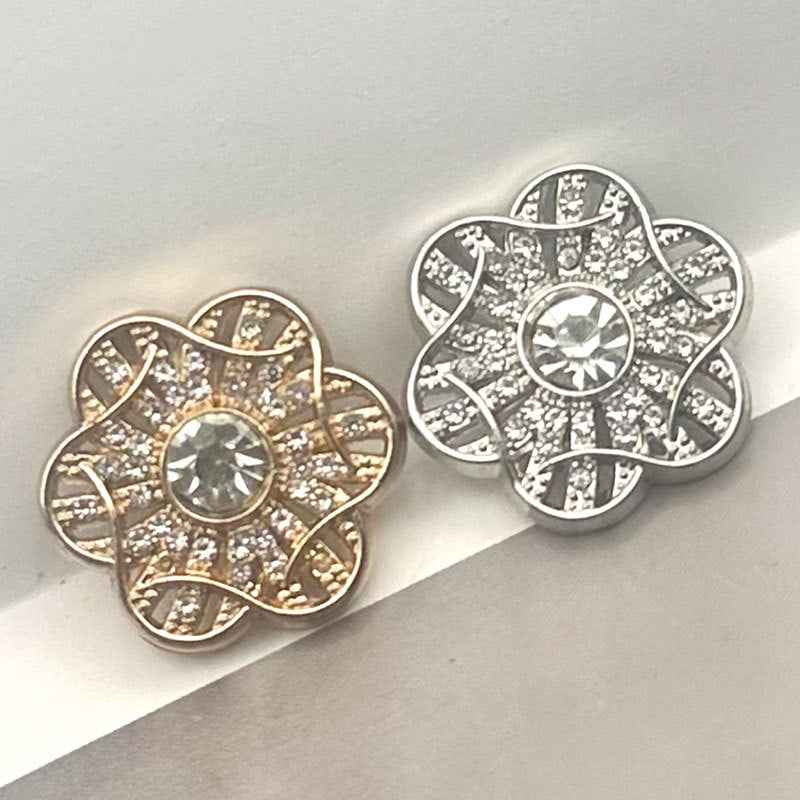 Floral crystal coat buttons with gold shank, round cutouts and center gem detail