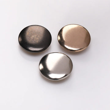 Curved 603 metal snap buttons set with gunmetal, gold, and silver domes