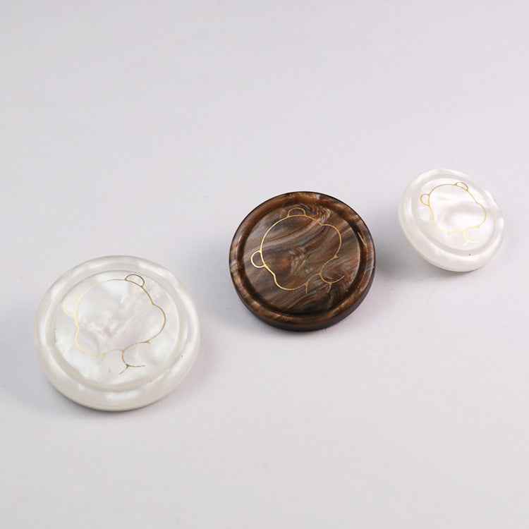Brown and white bear resin shank buttons with gold cartoon outline faces