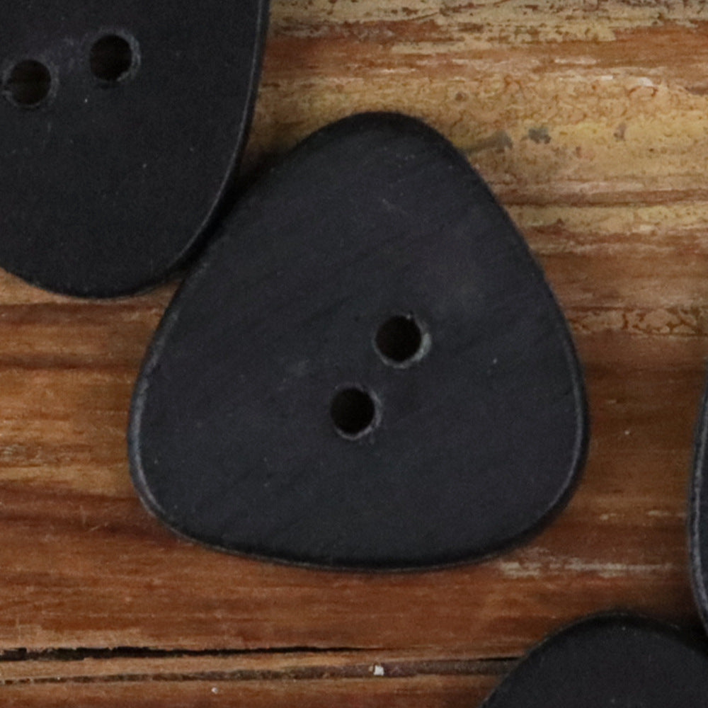 Black novelty button shaped like a rounded triangle, two-hole face