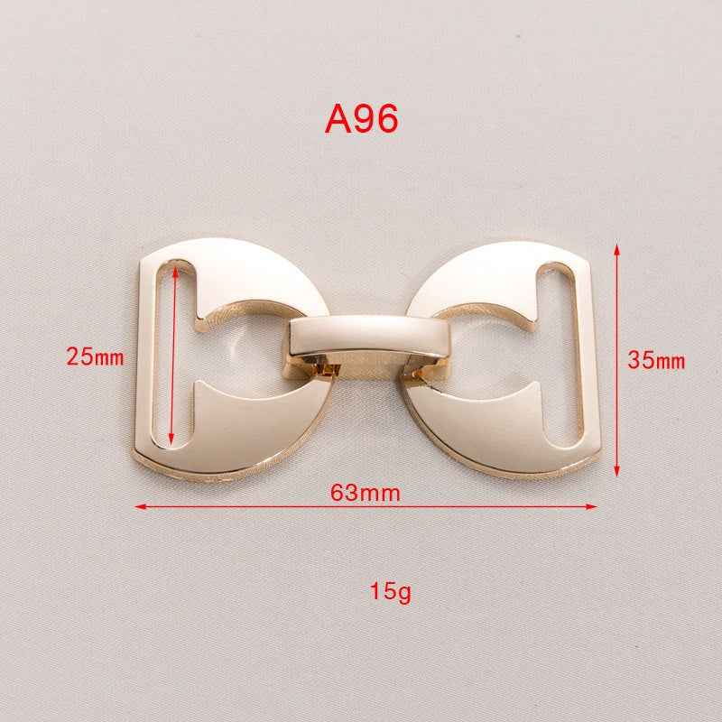 63x35mm detachable belt buckle clasp, gold-toned metal; 63mm wide, 25mm, 35mm tall