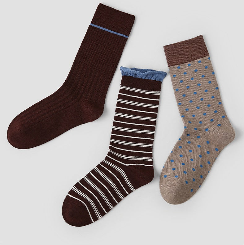 3-pack crew socks with blue cuff trim: dark brown solid, brown/white stripes, beige blue dots