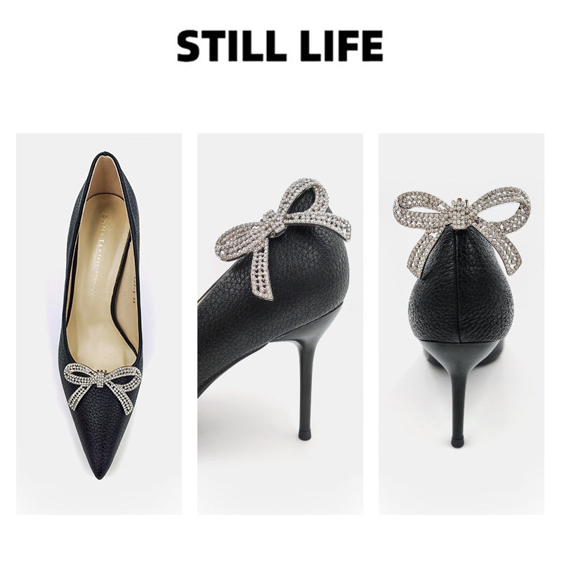 Silver rhinestone bow detachable clips on black high heels, bow at the front top