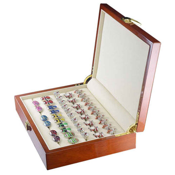 Open wooden cufflink display box with beige trays, showcasing colorful cufflinks