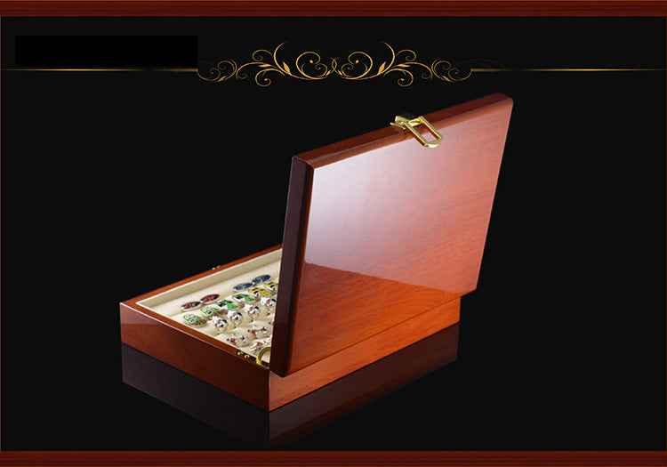 Open wooden cufflink display box with lid supported and beige interior storage