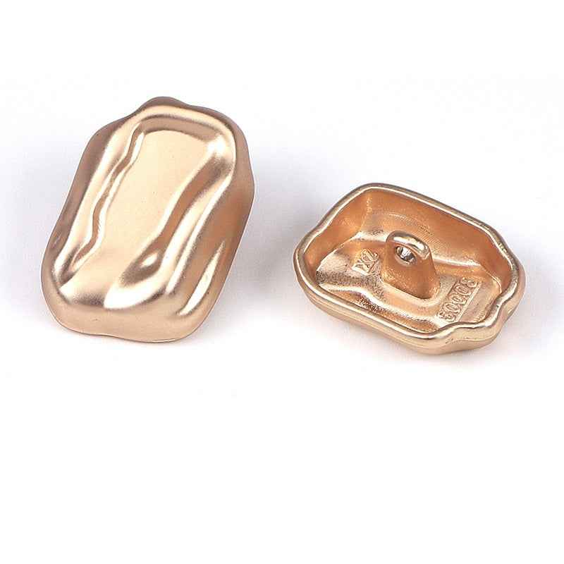 Rose-gold irregular metal shank button, front and back