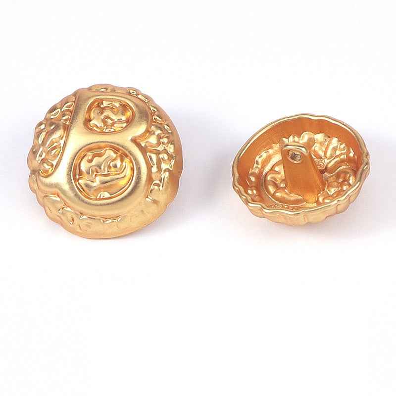 Gold domed letter B metal shank button, front and back views, embossed crest