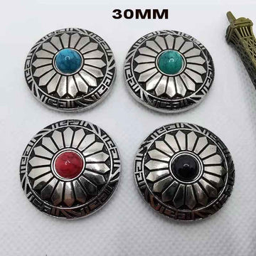 30mm round alloy button with turquoise cabochon and black-and-silver sunburst pattern