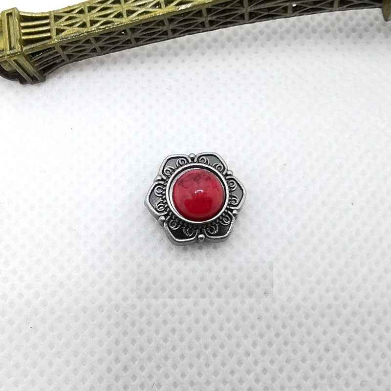 Antique silver rivet stud with red round stone and decorative scroll border