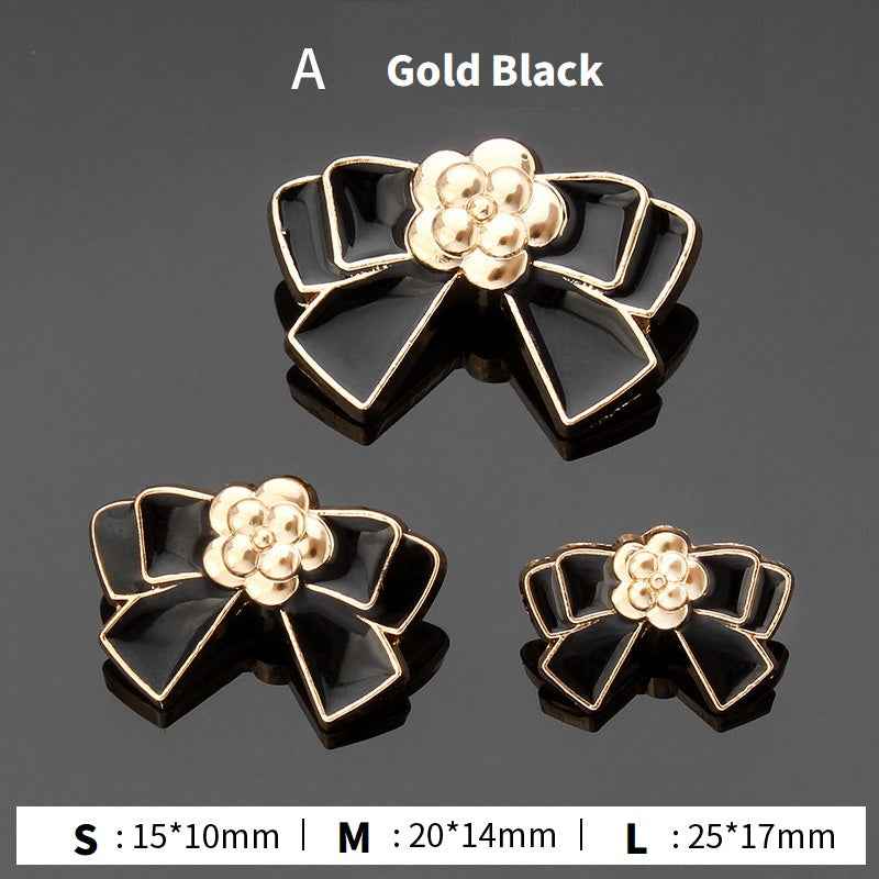 Style A bow buttons: gold and black enamel flower center, 3 sizes shown